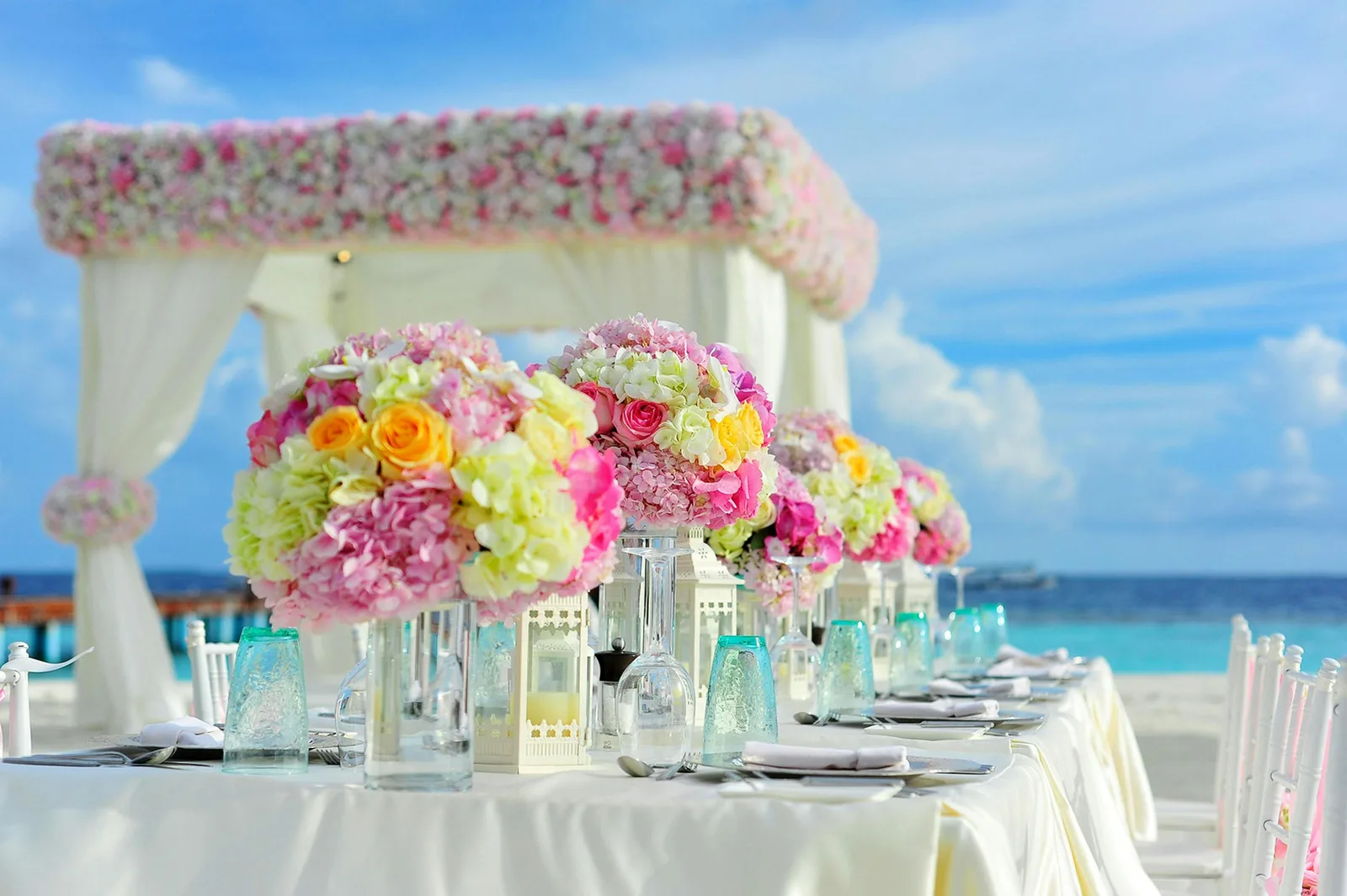 Colorful floral centerpiece on a wedding reception table in Australia